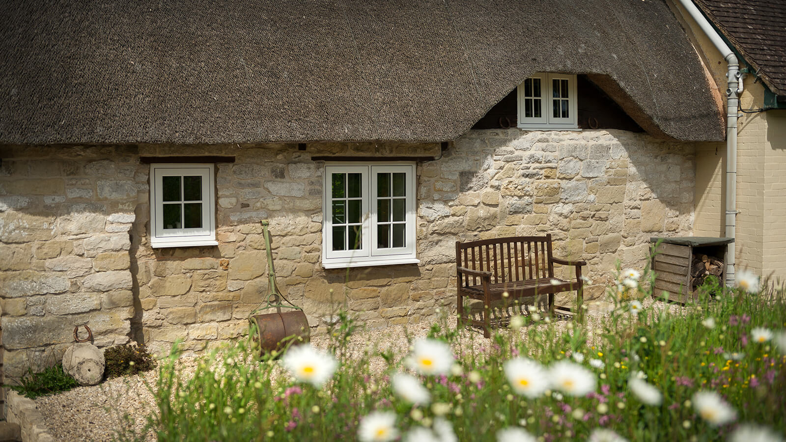 cream flush sash windows on cottage