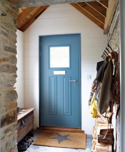 Discover a beautiful blue aluminium front door, ideal for modern country homes. High-quality Smarts doors combine style with durability.